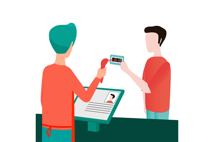 Vendeur scannant la carte de fidélité d'un client en caisse